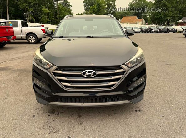 KM8J3CA29GU145985 2016 HYUNDAI TUCSON Black Հետևի տեսք