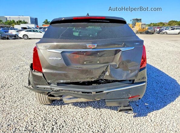 1GYKNARS0KZ205184 2019 CADILLAC XT5 Серый Вид салона спереди