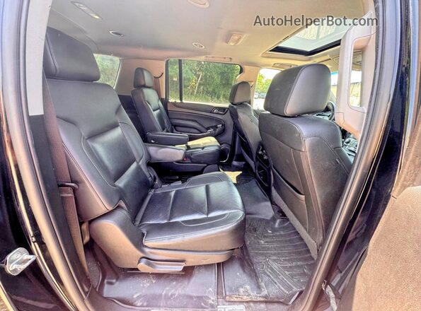 1GNSKHKC7KR132008 2019 CHEVROLET SUBURBAN Black Вид салону спереду