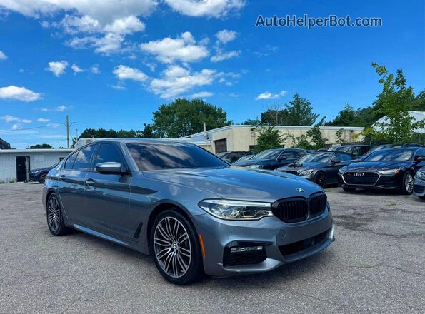 WBAJE7C50JG891256 2018 BMW 5 SERIES Charcoal Trasero izquierdo