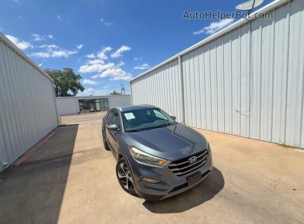 KM8J33A27GU111902 2016 HYUNDAI TUCSON Gray Tył lewy