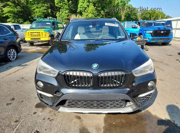WBXHT3C33G5E47698 2016 BMW X1 Black Հետևի տեսք