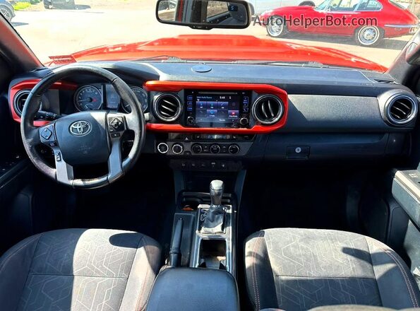 3TMCZ5AN3GM012158 2016 TOYOTA TACOMA Red Vista interior delantera