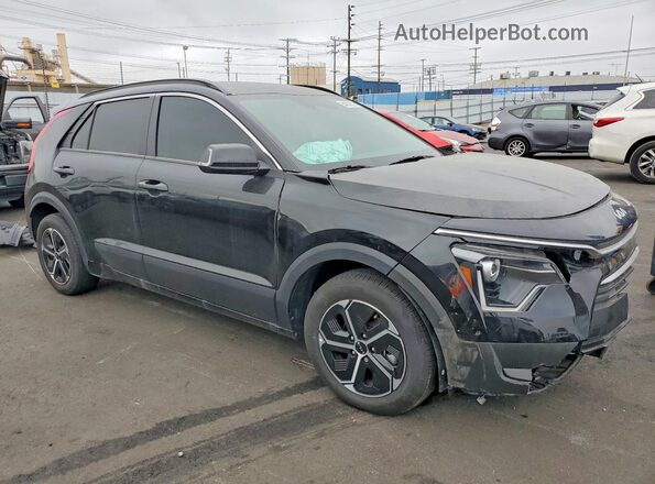 KNDCR3LE7S5219555 2025 KIA NIRO Black Դիմացի տեսք