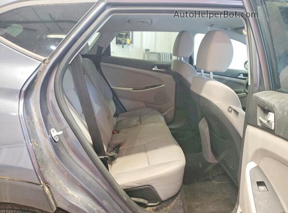 KM8J2CA4XKU956904 2019 HYUNDAI TUCSON Серый Вид задней части салона