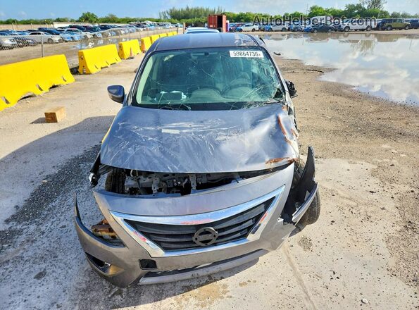 3N1CN7AP6KL867723 2019 NISSAN VERSA Серебряный Вид сзади