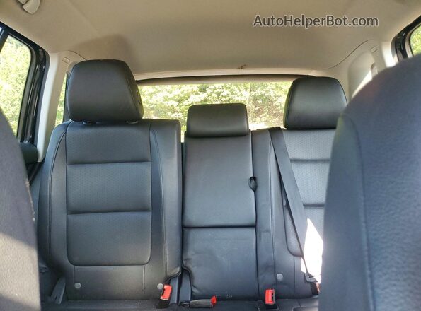 WVGBV7AX2HK029199 2017 VOLKSWAGEN TIGUAN Black Vista interior trasera