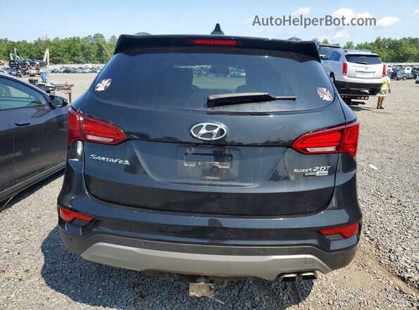 5XYZWDLA9HG395044 2017 HYUNDAI SANTA Black Front interior view
