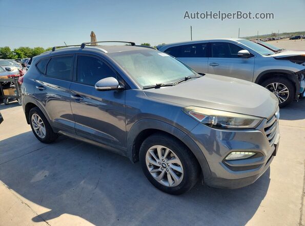 KM8J33A22GU199158 2016 HYUNDAI TUCSON Gray Դիմացի տեսք