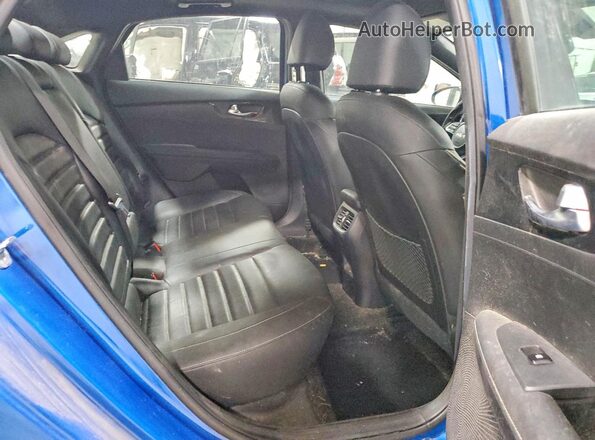 3KPF54AD4PE543860 2023 KIA FORTE Blue Rear interior view