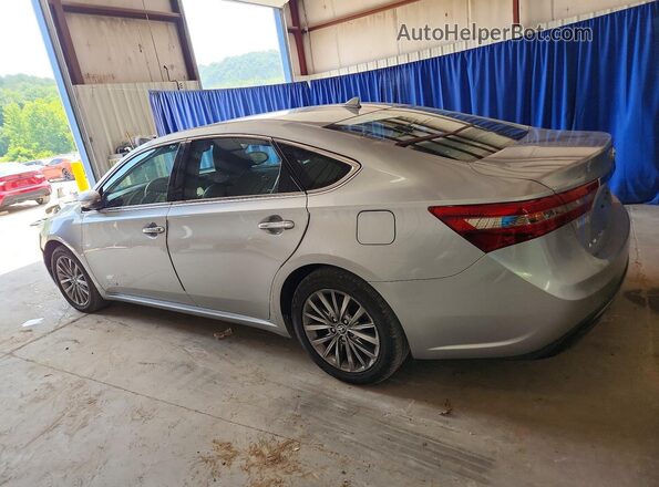 4T1BD1EB1GU056623 2016 TOYOTA AVALON Silver Trasero derecho