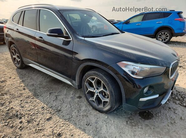 WBXHU7C58K3H45075 2019 BMW X1 Black Widok z przodu
