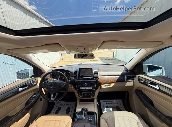 4JGDA5JB8GA630179 2016 MERCEDES-BENZ GLE-CLASS White Rear seats view