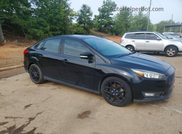 1FADP3FE2GL300560 2016 FORD FOCUS Black Front view