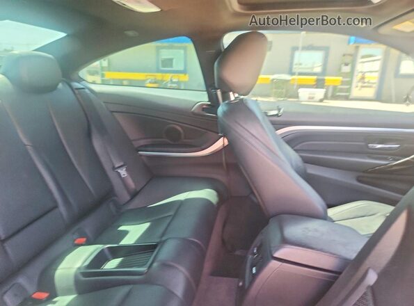 WBA3N7C51GK225750 2016 BMW 4 SERIES White Rear interior view