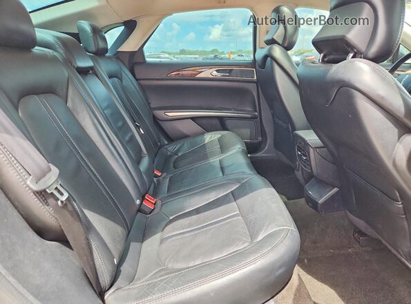 3LN6L2LU7GR622192 2016 LINCOLN MKZ Black Widok wnętrza z tyłu