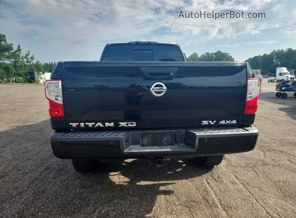 1N6BA1F44GN515860 2016 NISSAN TITAN Черный Вид салона спереди