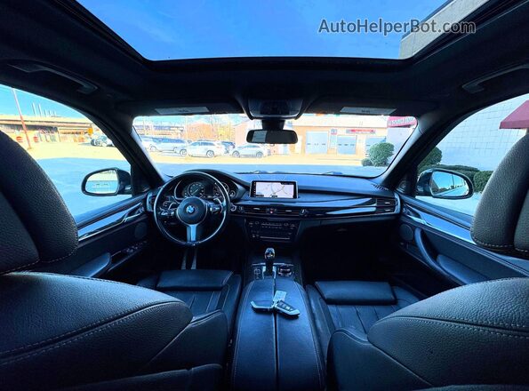 5UXKR6C55J0U15260 2018 BMW X5 Черный Вид панели приборов