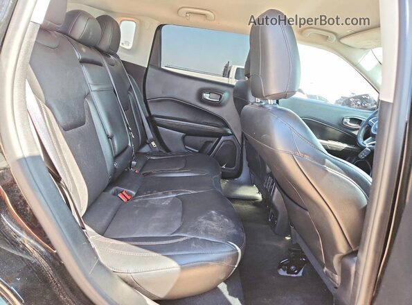 3C4NJCBB6HT669293 2017 JEEP COMPASS Black Rear interior view