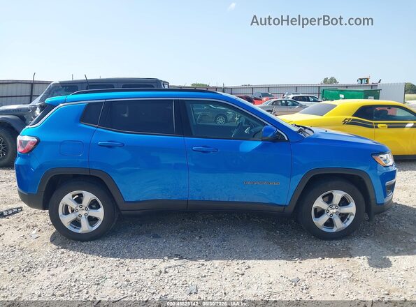 3C4NJCBB7KT699717 2019 JEEP COMPASS Blue Widok wnętrza z tyłu