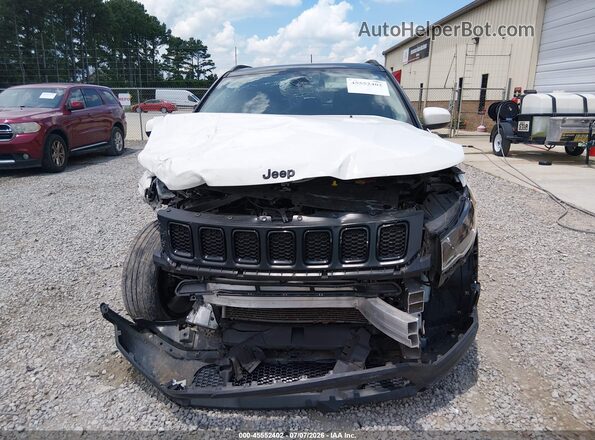 3C4NJCBB9MT570879 2021 JEEP COMPASS White Widok wnętrza z tyłu
