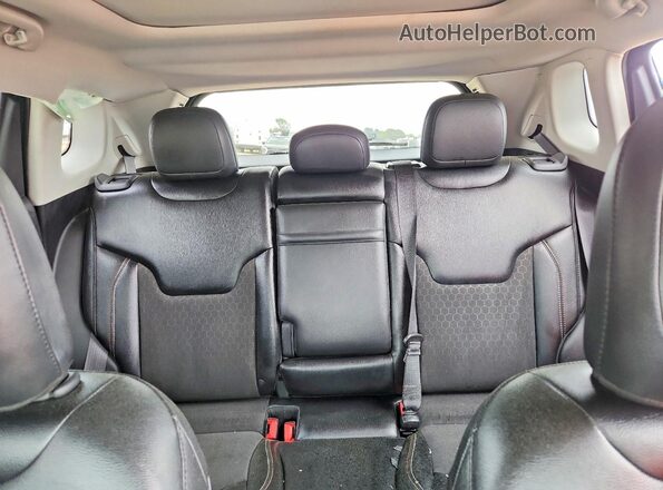 3C4NJCBBXHT661357 2017 JEEP COMPASS Black Rear seats view