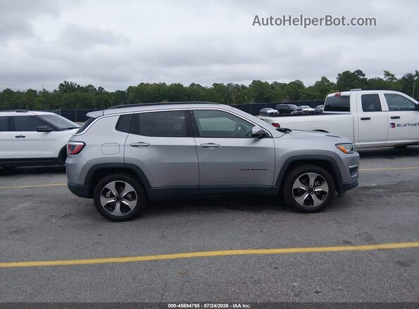3C4NJCBBXKT615647 2019 JEEP COMPASS Silver Vista interior trasera