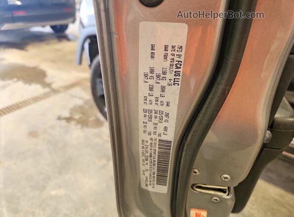 3C4NJDBB1JT323986 2018 JEEP COMPASS Silver VIN sticker view