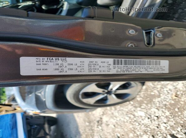 3C4NJDBB4JT103872 2018 JEEP COMPASS Black VIN sticker view