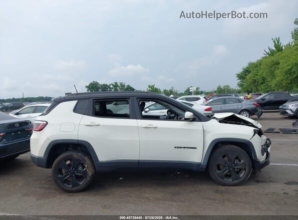 3C4NJDBB9KT648600 2019 JEEP COMPASS White Vista interior trasera