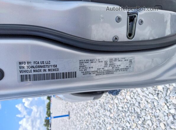 3C4NJDBN4ST571158 2025 JEEP COMPASS Silver VIN sticker view