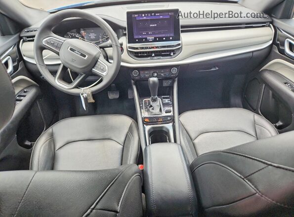 3C4NJDCN0ST522702 2025 JEEP COMPASS Blue Vista del salpicadero