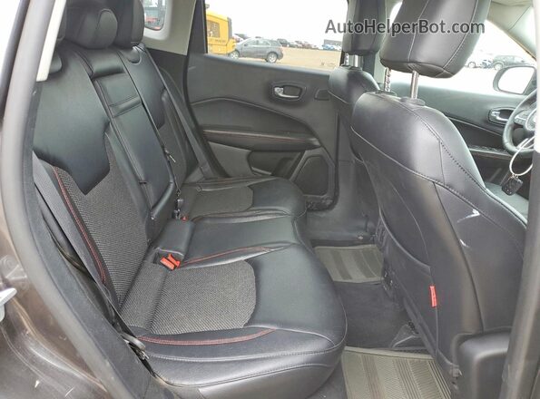 3C4NJDDB2HT630493 2017 JEEP COMPASS Black Rear seats view