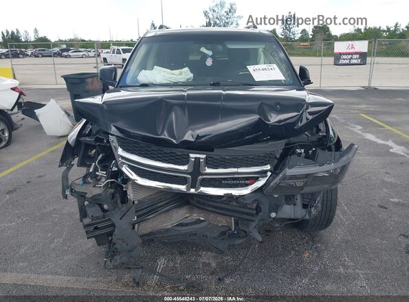3C4PDCBBXKT718390 2019 DODGE JOURNEY Black Widok wnętrza z tyłu