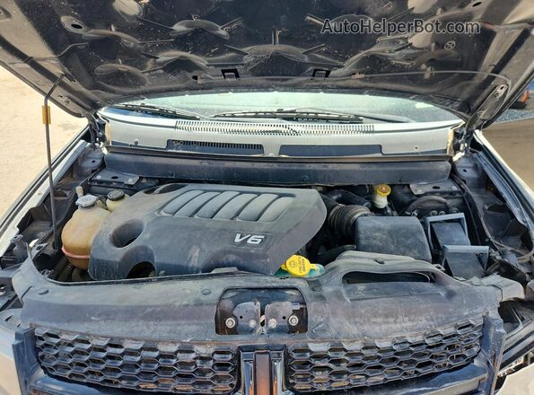 3C4PDCGG9GT225781 2016 DODGE JOURNEY Черный Вид задней части салона