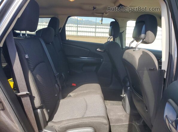 3C4PDDBG9KT695086 2019 DODGE JOURNEY Gray Սալոնի հետևի տեսք