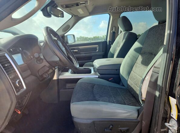 3C6RR6LT0HG504696 2017 RAM 1500 Черный Вид салона спереди