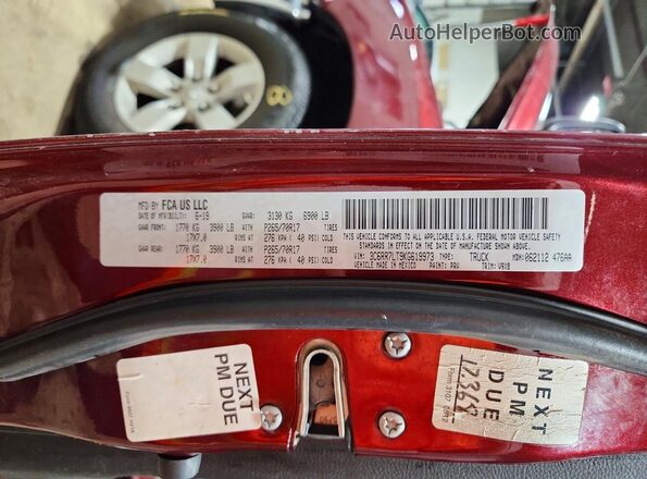 3C6RR7LT9KG619973 2019 RAM 1500 Burgundy Vista del compartimento del motor