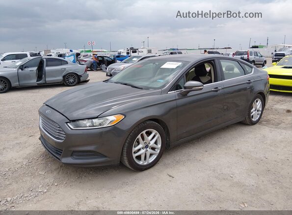 3FA6P0H71GR234865 2016 FORD FUSION Gray Vista tres cuartos delantera izquierda