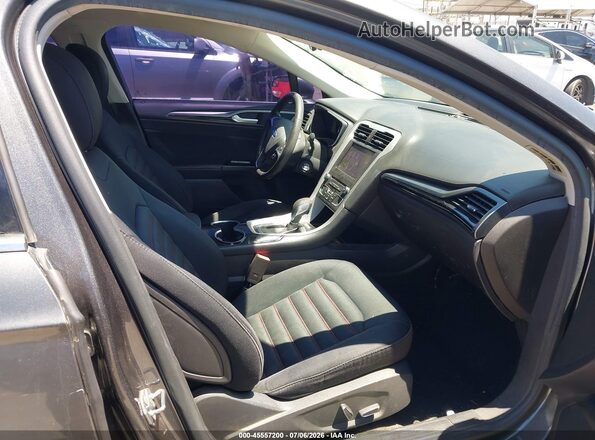 3FA6P0H71GR281815 2016 FORD FUSION Коричневый Вид салона спереди