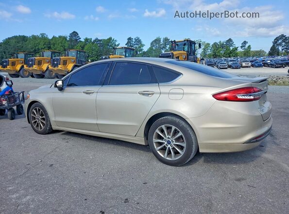 3FA6P0H72HR193258 2017 FORD FUSION Gold Trasero izquierdo