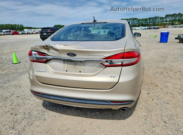 3FA6P0H76HR235477 2017 FORD FUSION Gold Vista trasera