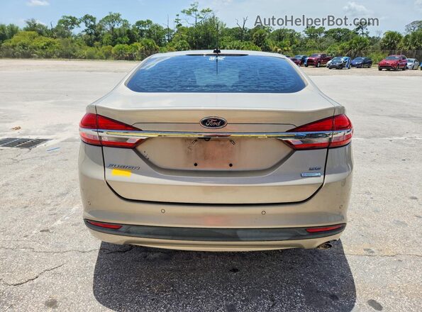 3FA6P0HD4HR364100 2017 FORD FUSION Золотой Вид сзади