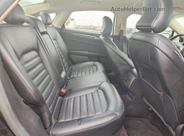 3FA6P0HD8HR316504 2017 FORD FUSION Black Vista de los asientos traseros