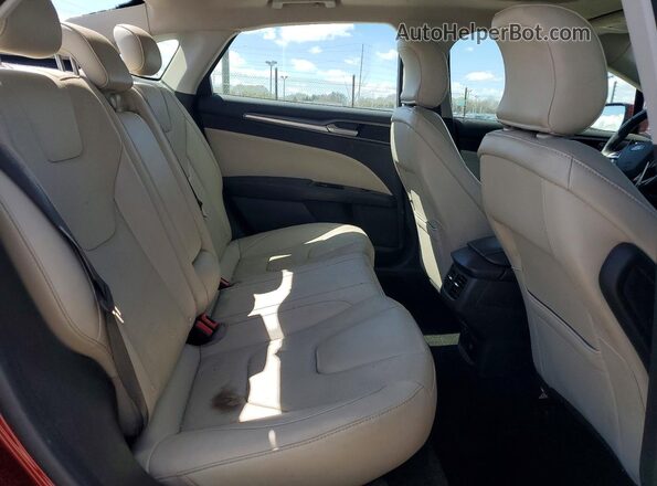 3FA6P0K98GR354012 2016 FORD FUSION Maroon Vista de los asientos traseros