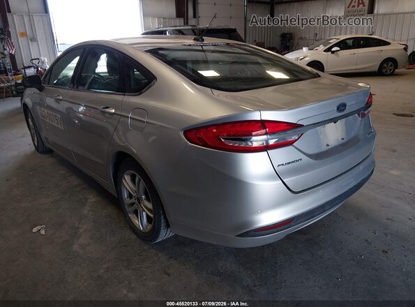 3FA6P0LU0JR243464 2018 FORD FUSION HYBRID Silver Rear left