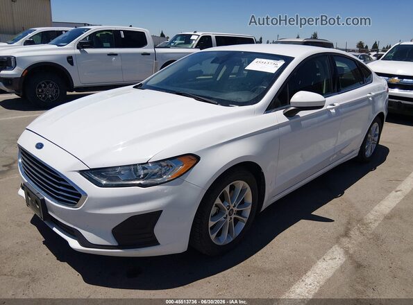 3FA6P0LU0LR231303 2020 FORD FUSION White Vista tres cuartos delantera izquierda