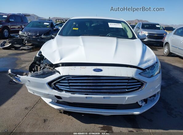 3FA6P0LU2HR233349 2017 FORD FUSION HYBRID White Vista interior trasera