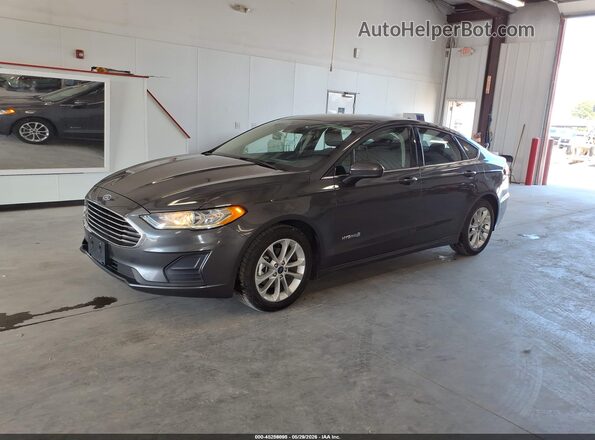 3FA6P0LU5KR274100 2019 FORD FUSION HYBRID Gray Vista tres cuartos delantera izquierda