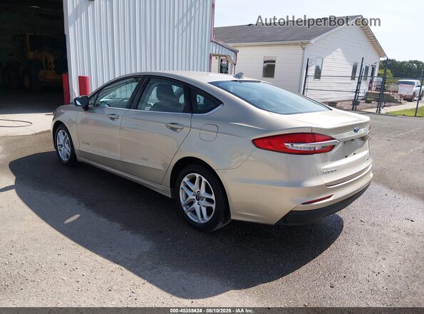 3FA6P0LU5KR274422 2019 FORD FUSION HYBRID Gold Rear left